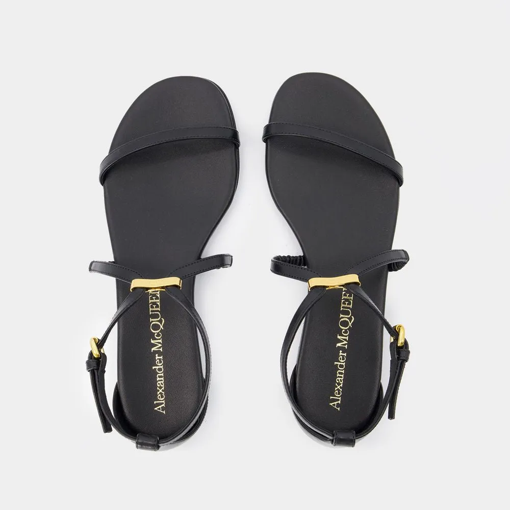 ALEXANDER MCQUEEN Elegant Harness Sandals with Gold Hardware