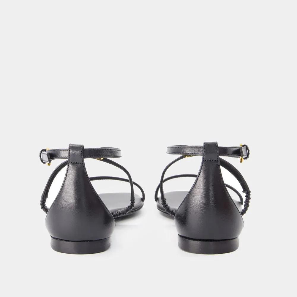 ALEXANDER MCQUEEN Elegant Harness Sandals with Gold Hardware