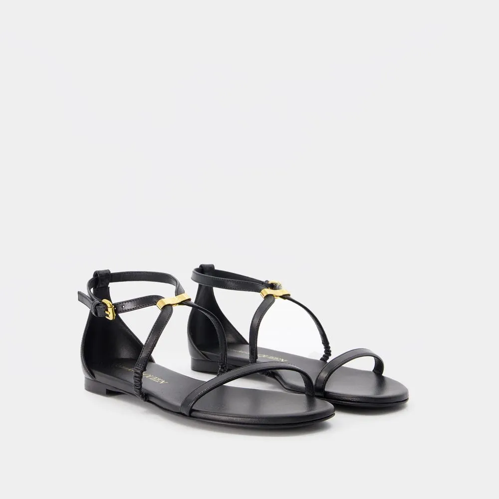 ALEXANDER MCQUEEN Elegant Harness Sandals with Gold Hardware