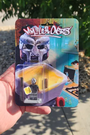 MM.. LeftOvers Metal Face Villain Minifigure w/ Packaging